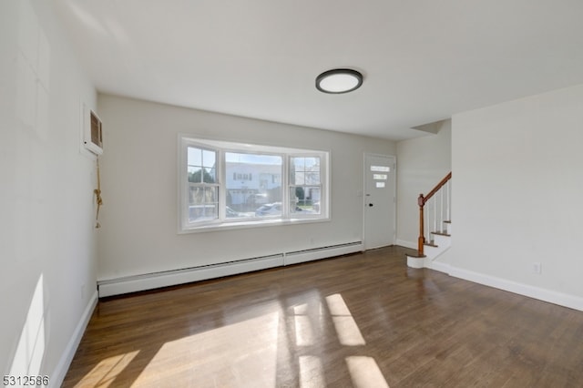 entrance foyer featuring dark wood-type flooring and baseboard heating