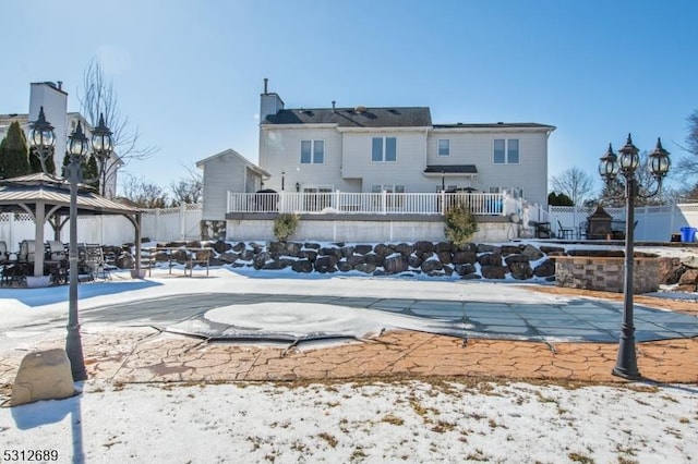 snow covered pool featuring a gazebo