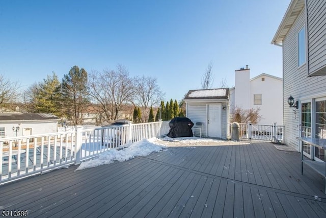 deck with a shed