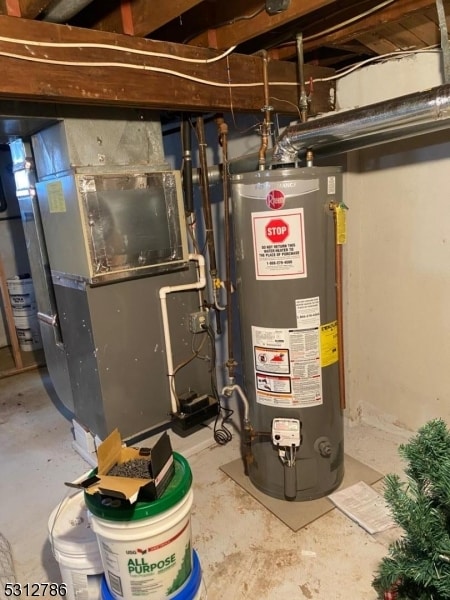 utility room with water heater