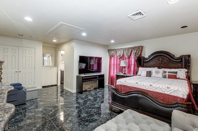 bedroom featuring ornamental molding and a closet