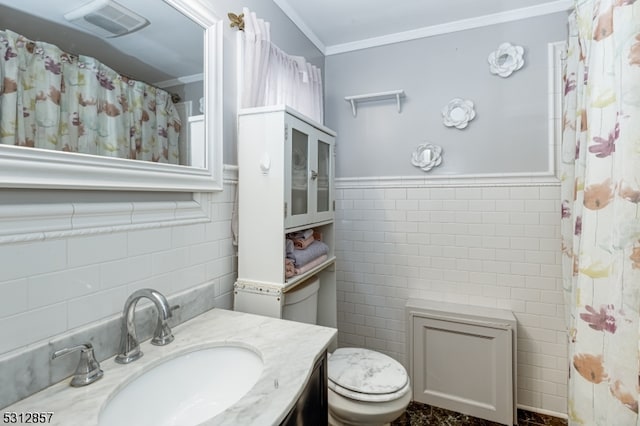 bathroom featuring tile walls, walk in shower, ornamental molding, vanity, and toilet