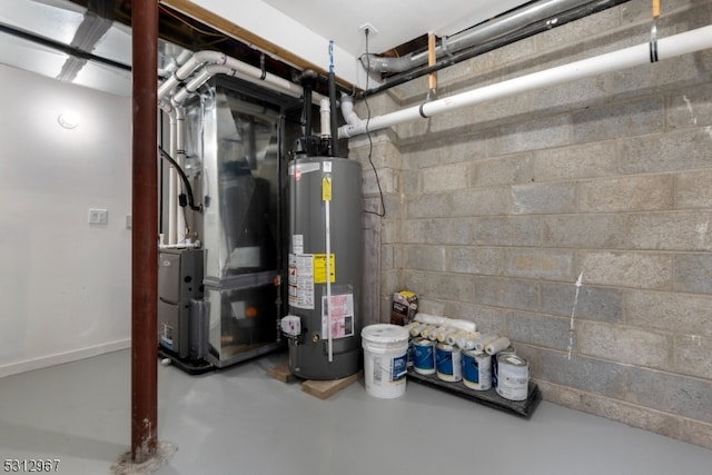 utility room featuring heating unit and gas water heater