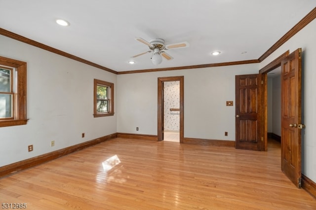 unfurnished room featuring light wood-type flooring, ceiling fan, and crown molding