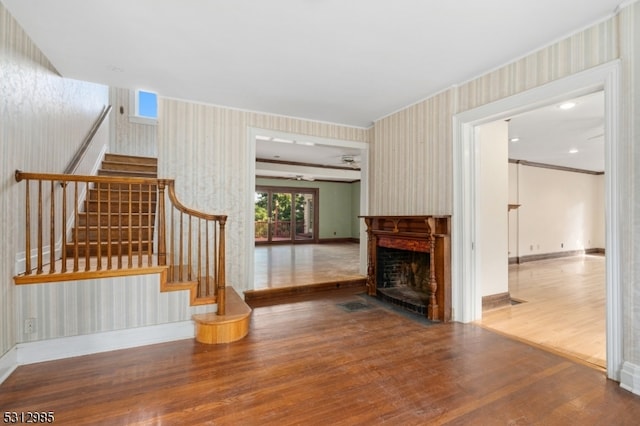 unfurnished living room featuring wood-type flooring