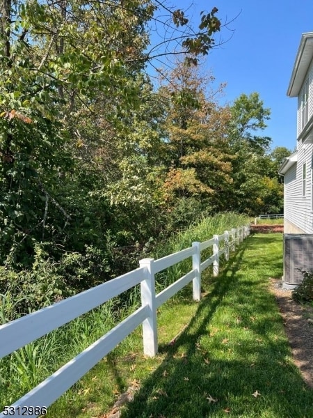 view of yard featuring central AC