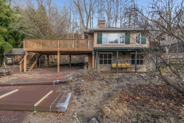 back of property with a deck