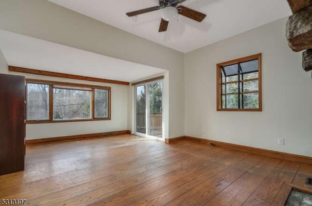 spare room featuring ceiling fan and light hardwood / wood-style floors