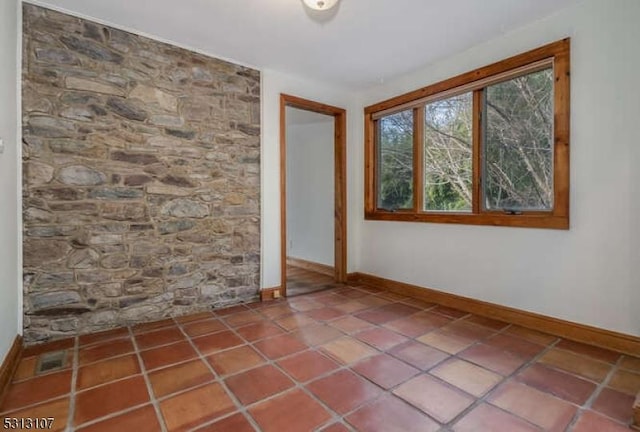 view of tiled spare room