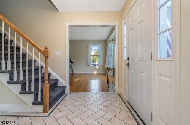 foyer with light wood-type flooring