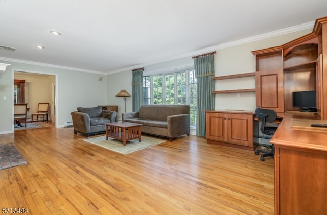 living room with light wood-type flooring, ornamental molding, and a baseboard heating unit