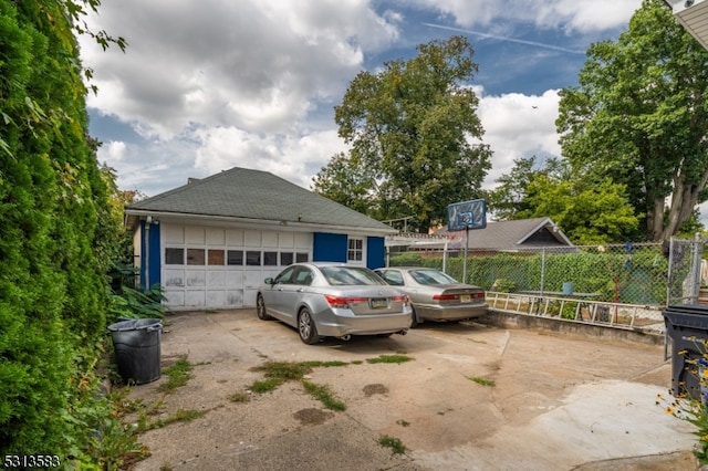 exterior space with a garage