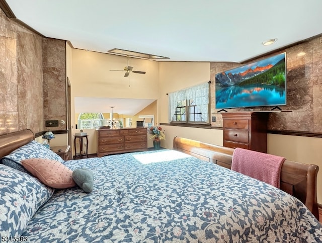 bedroom with lofted ceiling