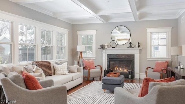 interior space featuring coffered ceiling and beamed ceiling