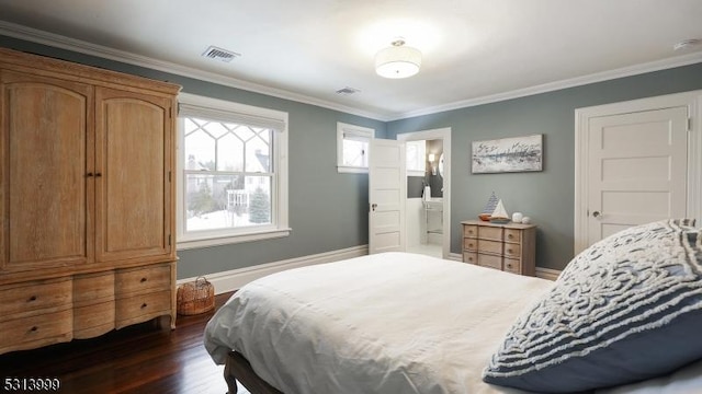 bedroom featuring crown molding and dark hardwood / wood-style flooring