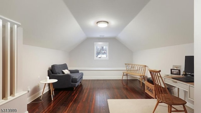 office area featuring vaulted ceiling and dark wood-type flooring