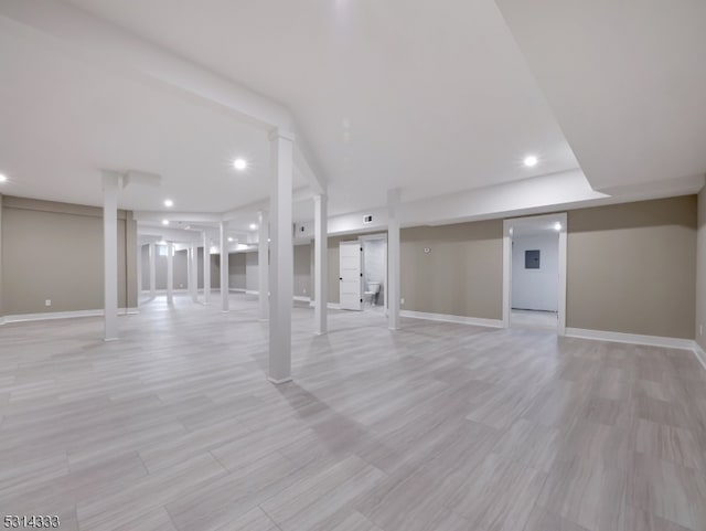 basement featuring light wood-type flooring