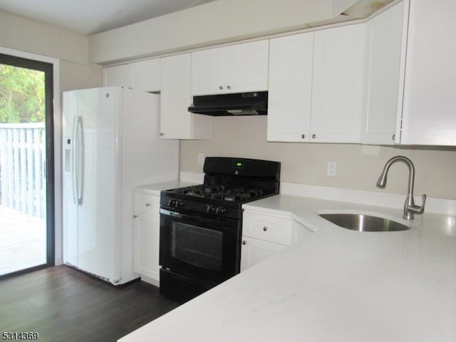 kitchen featuring sink, dark hardwood / wood-style floors, white fridge with ice dispenser, gas stove, and white cabinetry