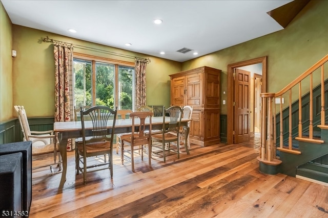 dining space featuring light hardwood / wood-style floors