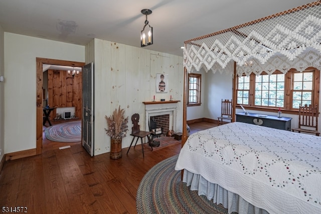 bedroom featuring dark hardwood / wood-style flooring