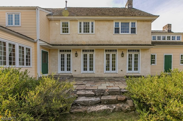 rear view of house featuring a patio