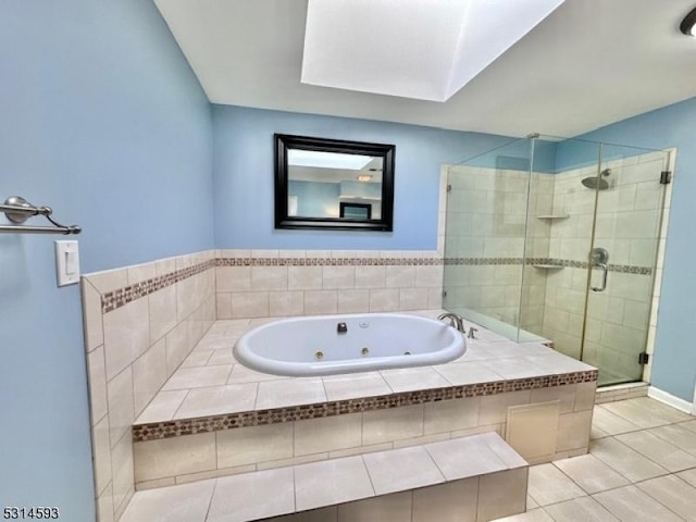 bathroom featuring tile patterned flooring and independent shower and bath