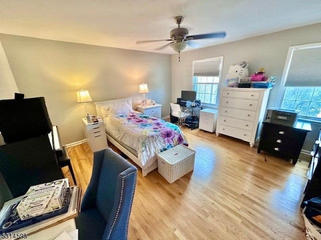 bedroom featuring ceiling fan and light wood-type flooring