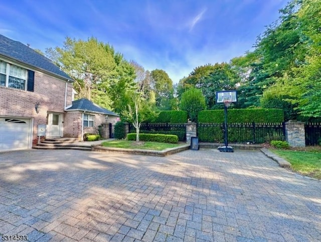 exterior space with a garage