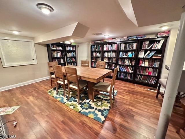 dining area featuring hardwood / wood-style floors