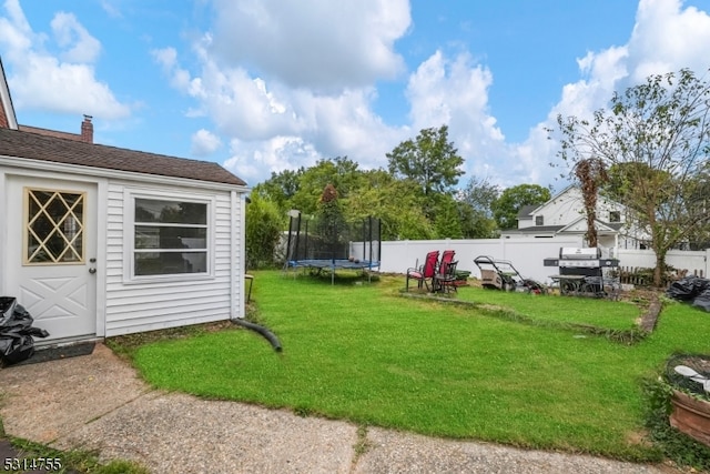 view of yard featuring a trampoline