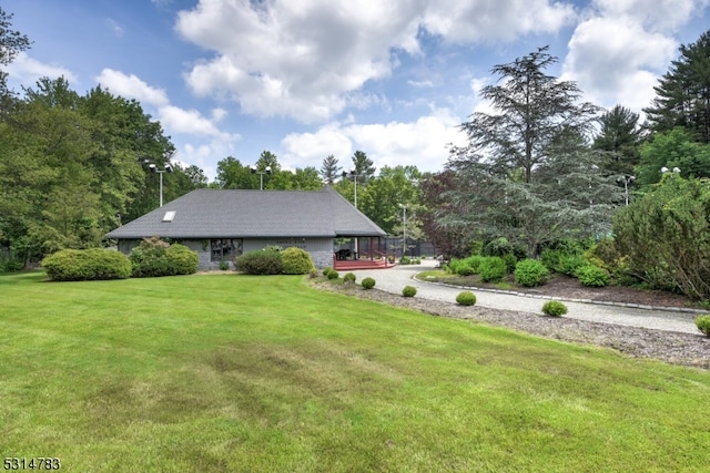 exterior space with a front lawn