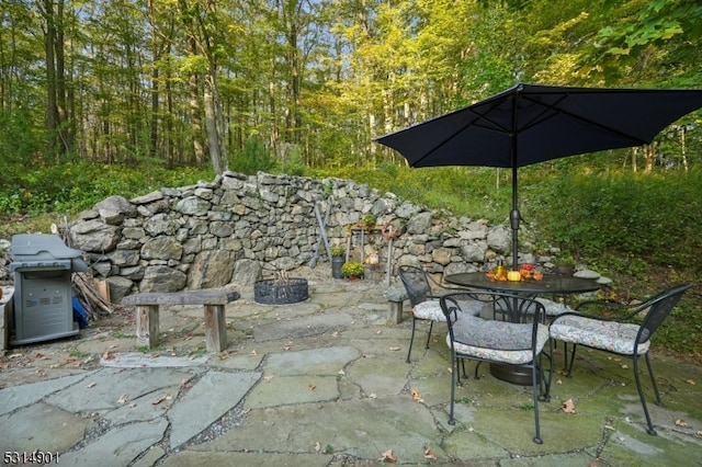 view of patio with a grill