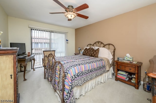 bedroom with ceiling fan and light colored carpet