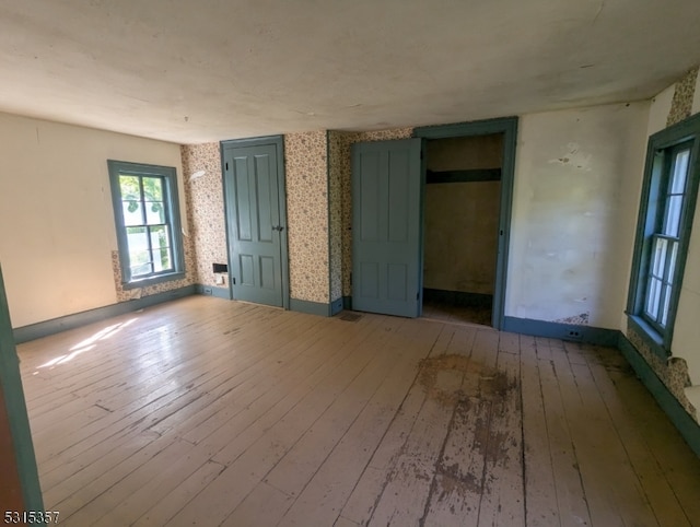 empty room featuring wood-type flooring