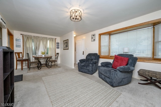 living room featuring light carpet