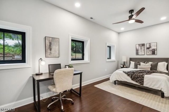 bedroom featuring recessed lighting, visible vents, baseboards, and dark wood finished floors