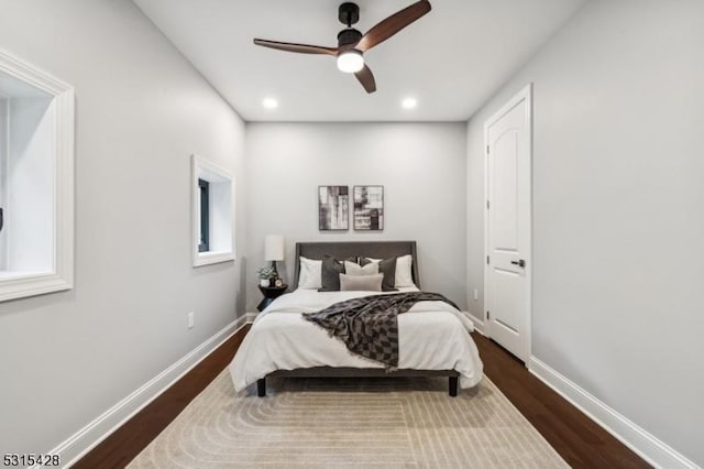 bedroom with recessed lighting, baseboards, a ceiling fan, and dark wood finished floors
