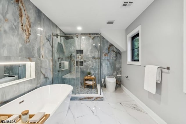 full bathroom featuring a freestanding bath, visible vents, a marble finish shower, and toilet