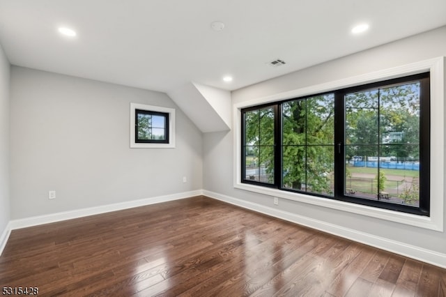 interior space with dark hardwood / wood-style floors