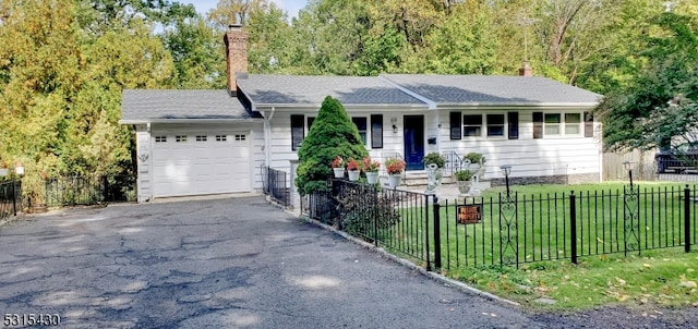 ranch-style house with a garage, a porch, and a front yard