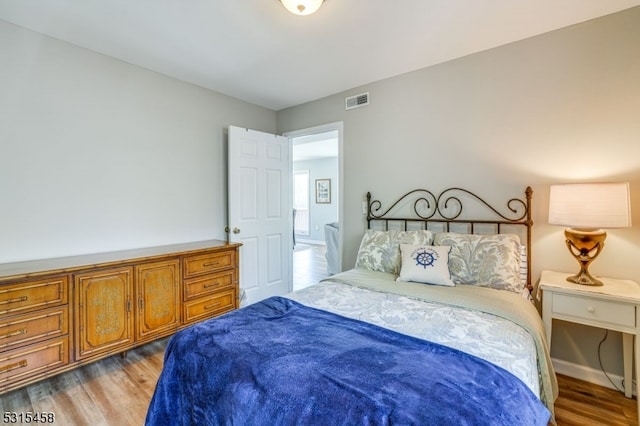 bedroom featuring light wood-type flooring