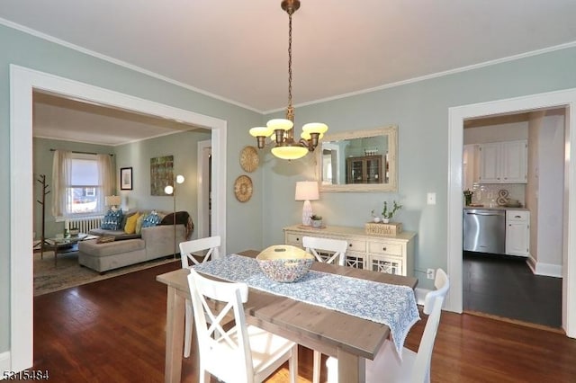 dining room with dark wood-style floors, ornamental molding, radiator heating unit, and an inviting chandelier