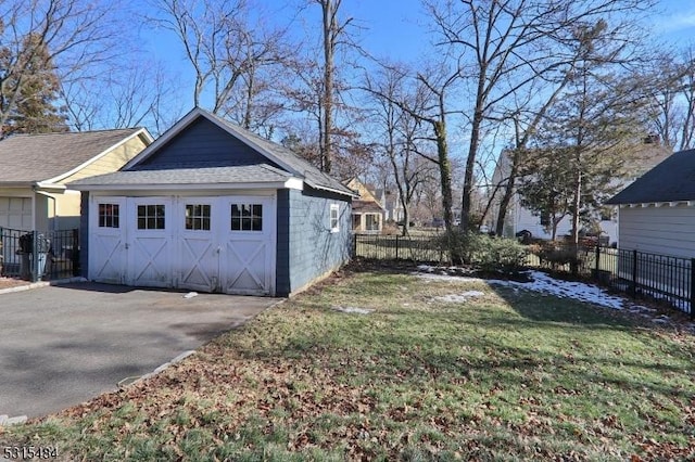 detached garage with fence