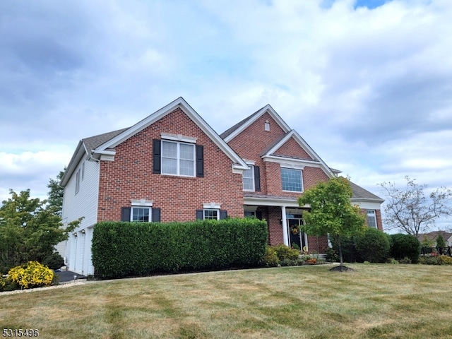 view of front of property with a front lawn