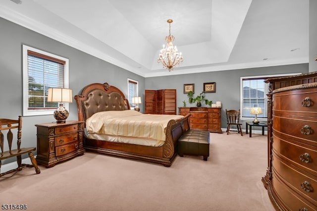 bedroom featuring light carpet, multiple windows, and a chandelier