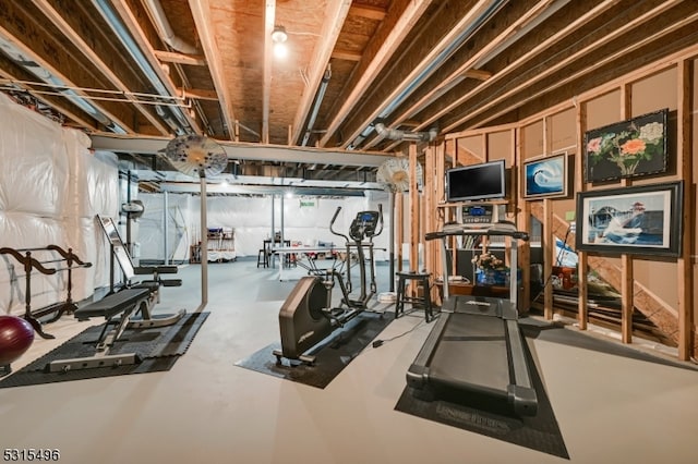 workout room with concrete flooring