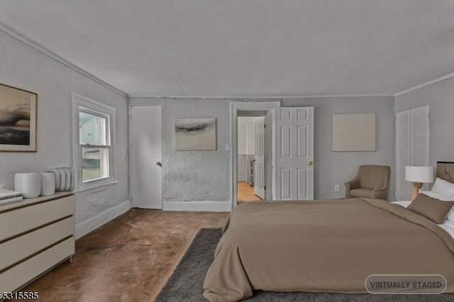 bedroom featuring crown molding