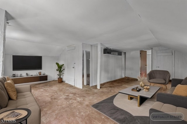 living room with vaulted ceiling