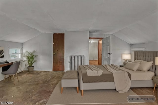 bedroom with lofted ceiling and radiator heating unit