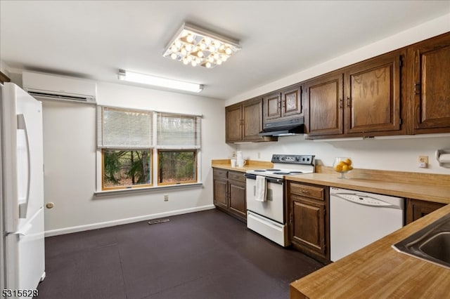 kitchen featuring a wall unit AC, butcher block countertops, white appliances, and sink